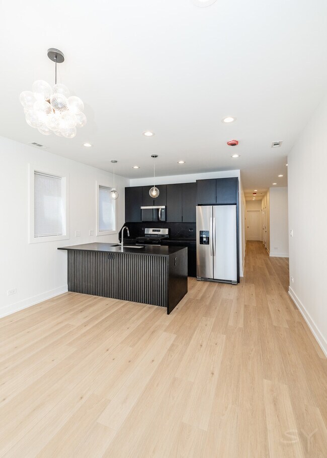 Foto del edificio - 6050 S Eberhart Ave