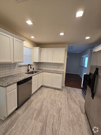 Building Photo - 8926 Trumpet Cir