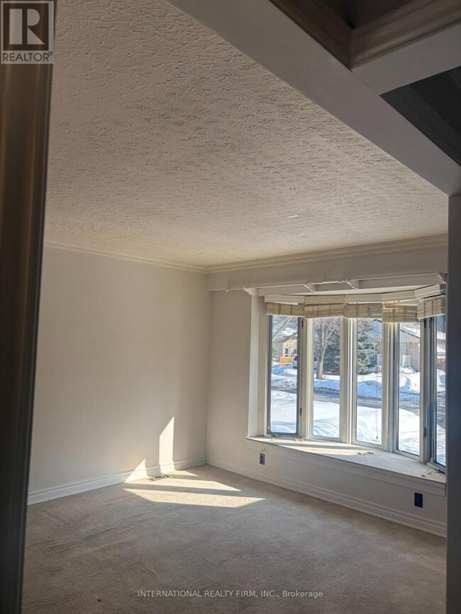 Building Photo - 397 Centre St E