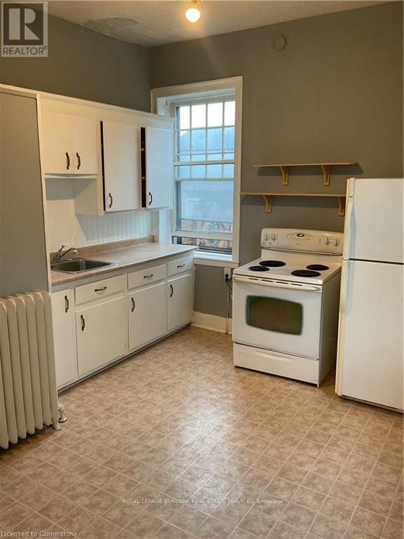 Photo du bâtiment - 303-303 E 19th St