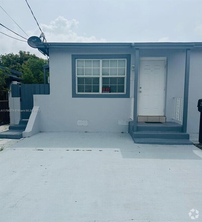 Building Photo - 115 NW 56th Ave.