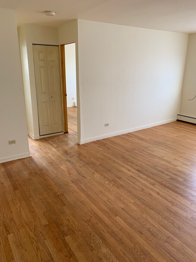 Living Room With Adjacent Hallway - 5555 N Rockwell St