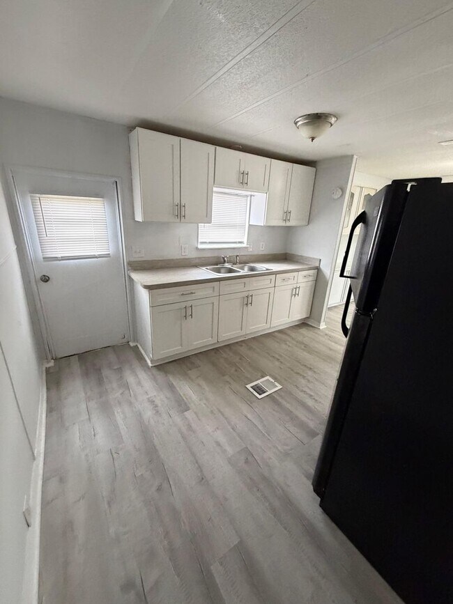 Foto del edificio - Woodland Estates MHP