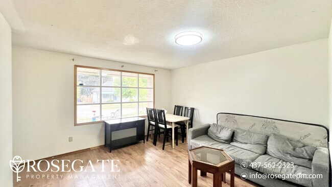 Building Photo - Bright & Spacious 3-Bedroom Main Floor Uni...