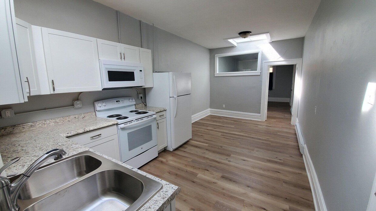 Kitchen and Living room, looking towards bedroom - 116 W Main St