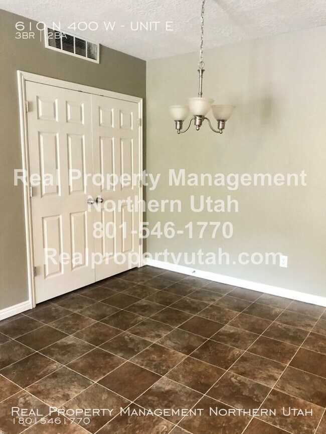Building Photo - Charming condo- now available!
