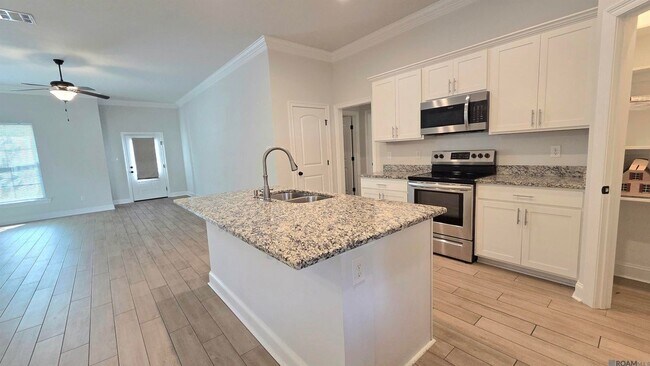 Foto del edificio - 7004 Spring Gardens Dr