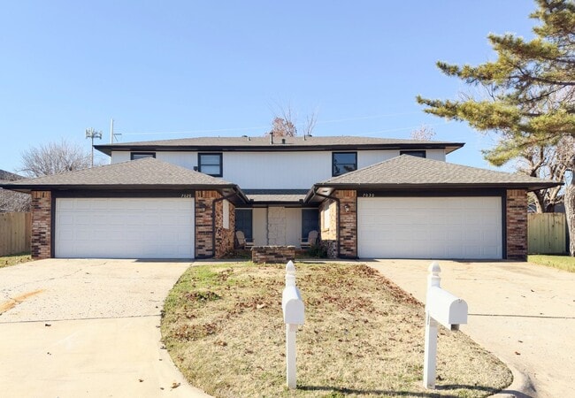 Photo - Updated 3-Bedroom, 2-Bathroom Duplex with a Spacious Fenced Backyard! House