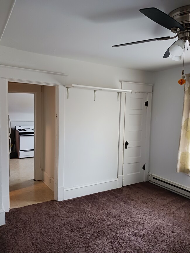 south facing view of bedroom showing entrance to kitchen and bedroom closet. - 410 W Columbia Ave