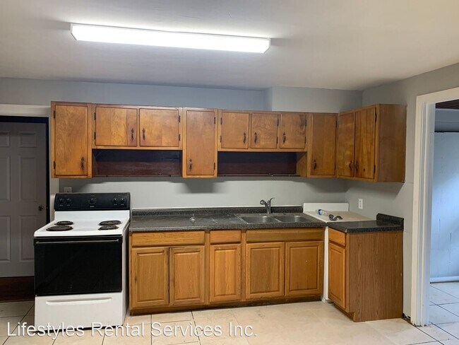 Foto del edificio - 4 br, 1.5 bath House - 5214 Lexington Ave ...
