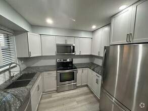 Building Photo - 5205 Bayside Dr