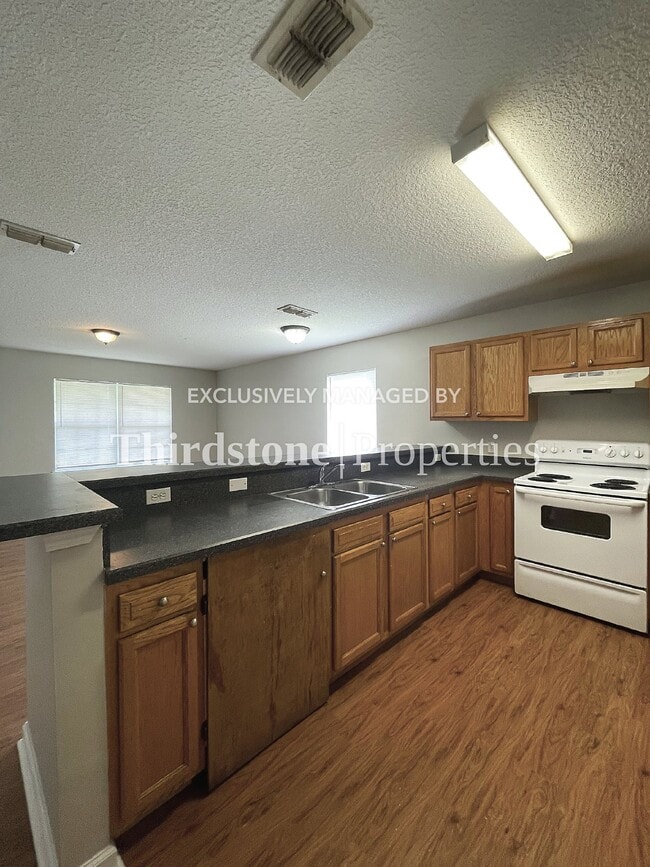 Building Photo - 9248 8th Ave