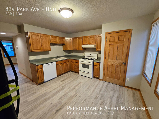 Building Photo - "Spacious 3-Bed with Private Balcony & Sky...