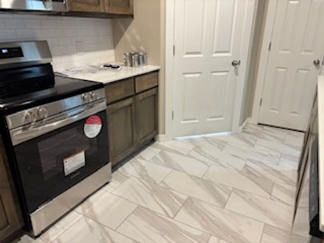 Building Photo - BRAND NEW HOME!  First month free!