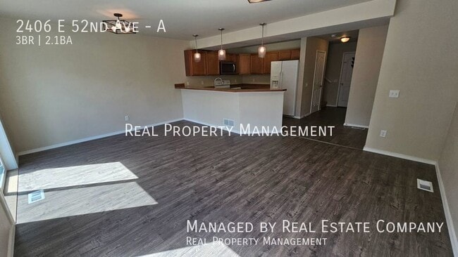 Building Photo - 2406 E 52nd Ave