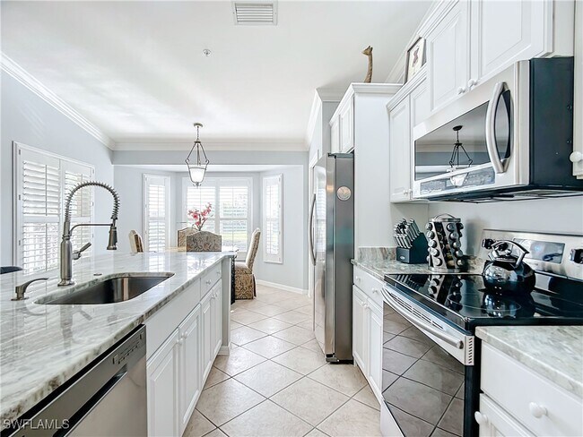 Foto del edificio - 10401 McArthur Palms Ln