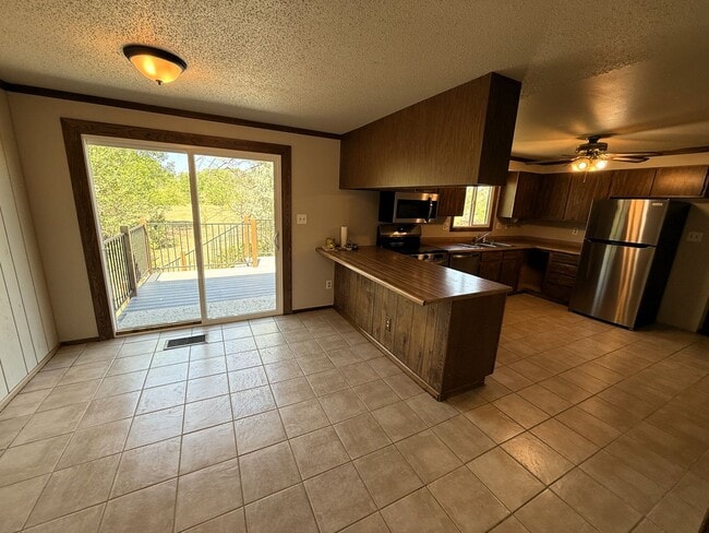 Building Photo - Charming 4-Bed Retreat on 2 Acres with Barn & Garage