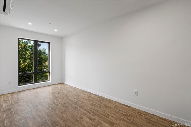 Building Photo - 213-41 38th Ave