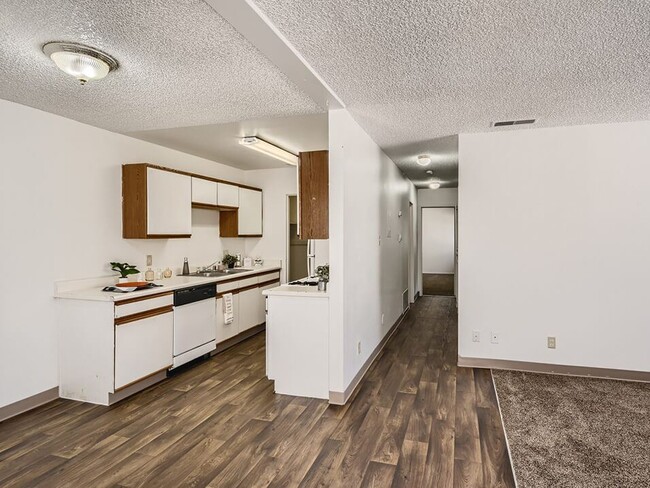 Kitchen and Hallway to Bedrooms - Mesa Gardens