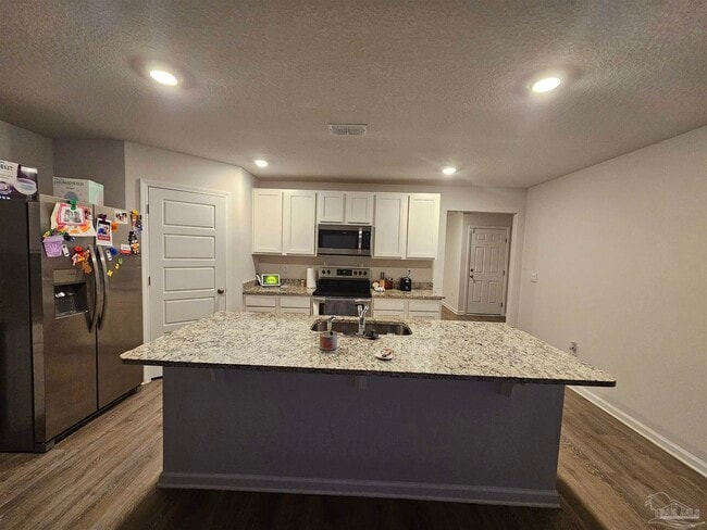 Foto del edificio - 6304 Burrow Ln