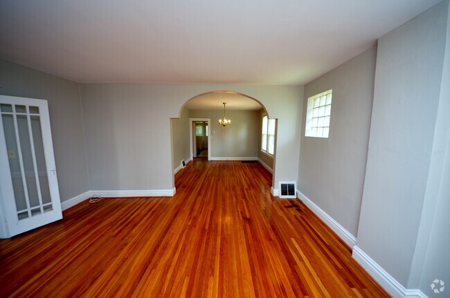 Living room looking into dining room - 6129 W Park Ave