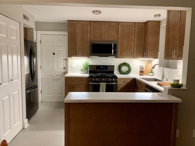 Kitchen & Back Entry To Garage - 7745 Kingsbury Blvd