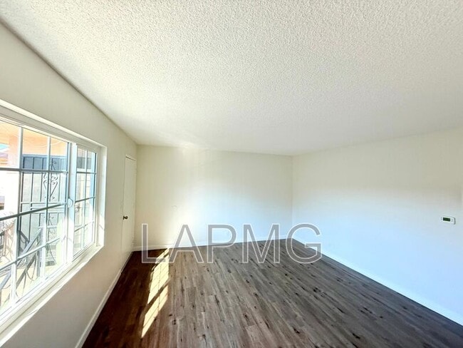 Building Photo - 7039-7039 Miles Ave