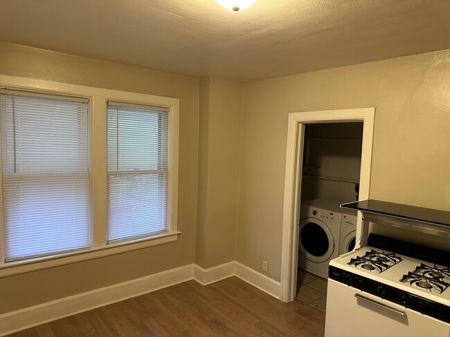 Kitchen with laundry room pic from 11-15-24 - 1618 N 6th St