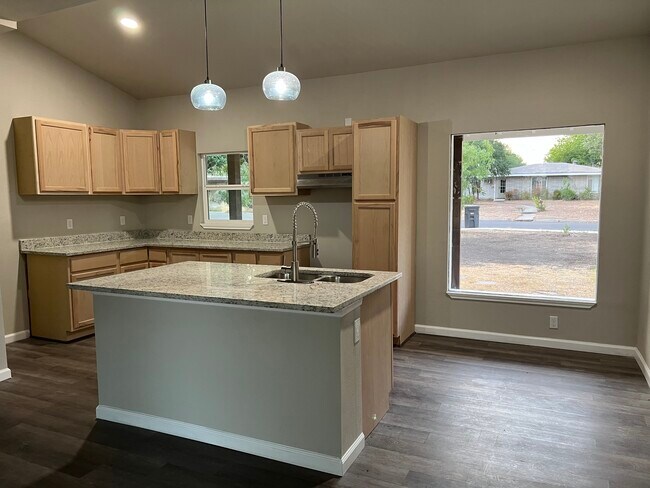 Kitchen with new stainless still appliances ref, stove, dishwasher - 220 Dalehurst Dr