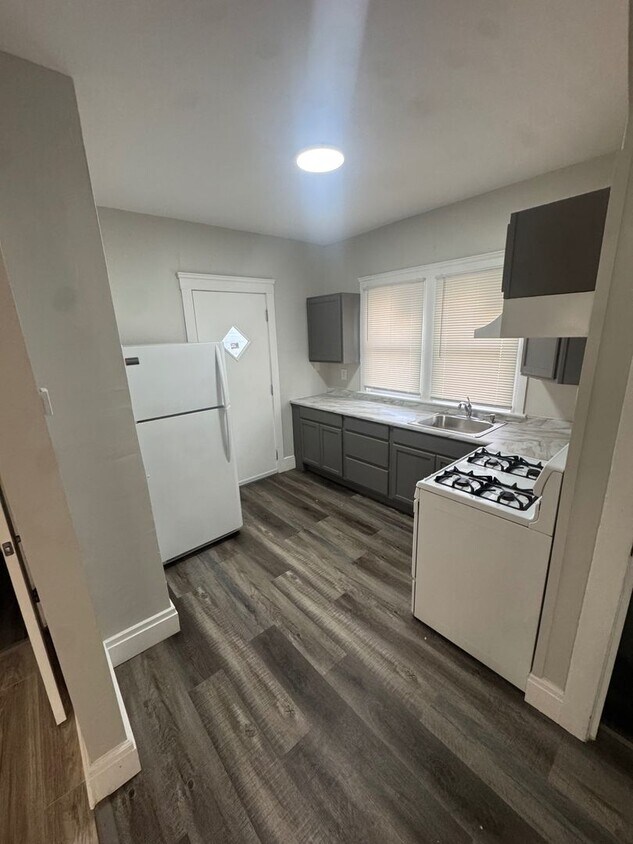 Primary Photo - Charming 4-Bedroom Property in Prime Location