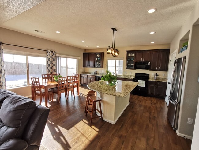 Large kitchen island - 17778 E 44th Ave