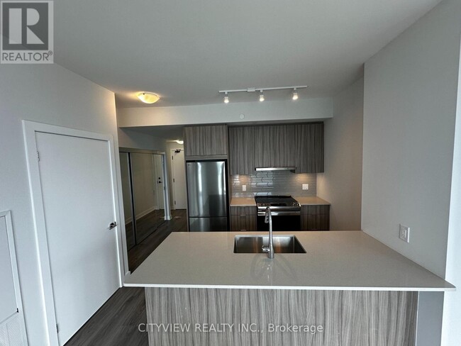 Photo du bâtiment - 430-4430 Square One Dr