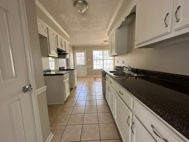 Building Photo - 7316 Peppermill - Available Now!