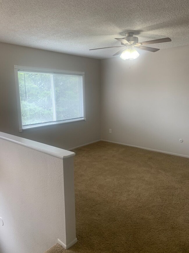 Building Photo - 3 BEDROOM, 2 BATHROOM SINGLE FAMILY HOME WITH 2 CAR ATTACHED GARAGE