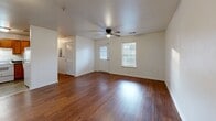 Located at 904 Knotty Oak Way in Knoxville, Tennessee, this single-floor, 2-bedroom, 2-bathroom home offers a practical and comfortable layout. The spacious living room is a central highlight, featuring warm hardwood-style flooring, a ceiling fan with light, and multiple windows that allow natural light to fill the space. A front entry door and a nearby louvered closet add functional convenience to the living area.

The U-shaped kitchen is well-appointed with warm wood cabinetry, dark countertops, tile flooring, and white appliances including a refrigerator, electric range, and dishwasher — providing ample storage and workspace.

Both bedrooms are carpeted for comfort and include ceiling fans, natural light from windows with blinds, and generous closet space. The primary bedroom is notably spacious and features a dedicated closet with paneled doors.

The two bathrooms each include a full tub/shower combination with clean white surrounds, maintaining a consistent and functional aesthetic throughout.

Connecting hallways tie the layout together efficiently, making the home feel organized and easy to navigate. Overall, the home presents a clean, functional design well-suited for comfortable everyday living in the Knoxville area.