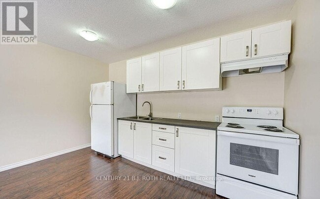 Photo du bâtiment - 303-303 Moffat St