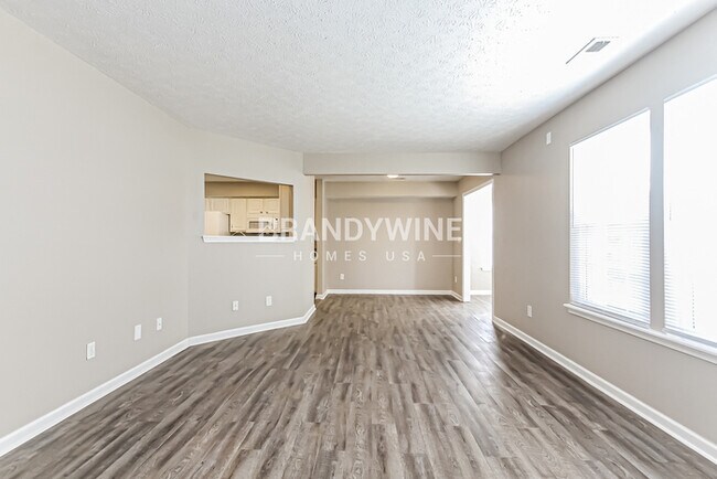 Building Photo - NEW LOWER RENTAL RATE LEASING SPECIAL: Rec...