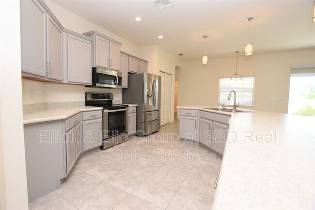 Building Photo - 5994 Valentino Way