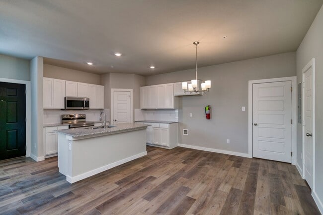 Building Photo - GORGEOUS 2 BEDROOM FOUR PLEX LOCATED IN MI...