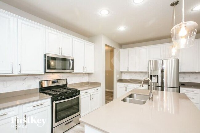 Building Photo - 6640 Harvest Moon Lane