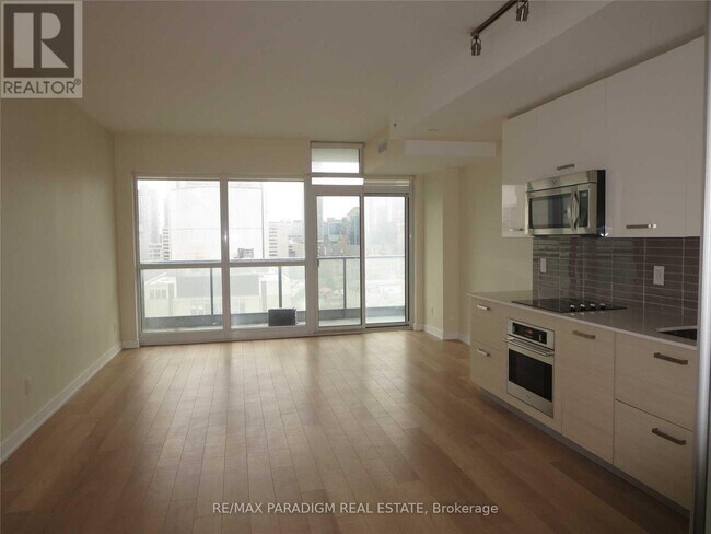 Photo du bâtiment - 210-1210 Simcoe St