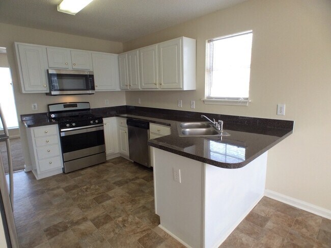 Foto del edificio - 4033 Rhinehart Ct