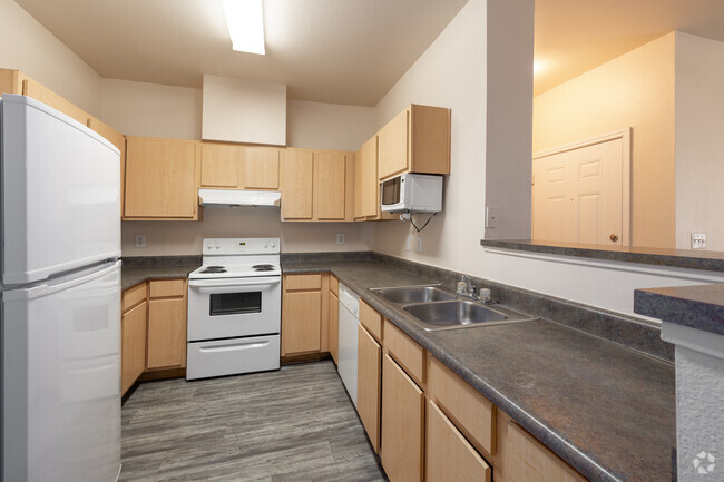 3BR, 2BA Kitchen - Vida Que Canta Apartments