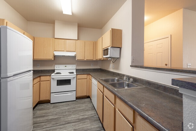 3BR, 2BA Kitchen - zVida Que Canta Apartments