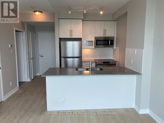 Photo du bâtiment - 1171 Queen St W