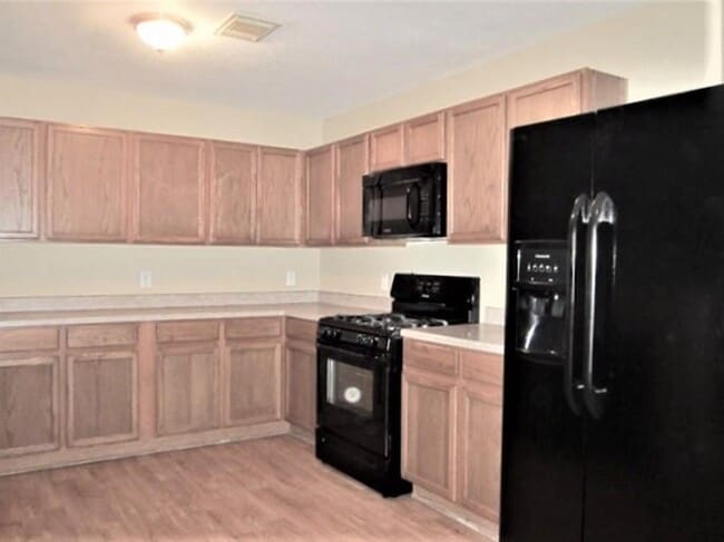Foto del edificio - 9618 Lasbury Dr