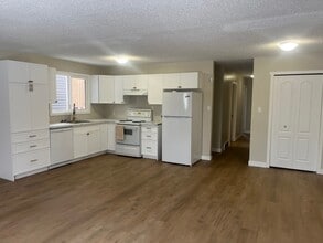 Building Photo - 4111-4149 49 Ave