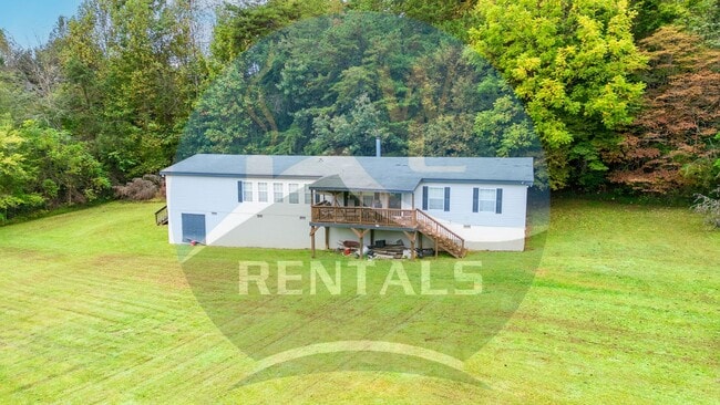 Foto del edificio - 4 bedroom 2 bath Double-Wide Trailer taste...