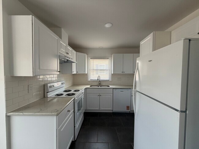 Foto del edificio - 5701 Wildberry Dr