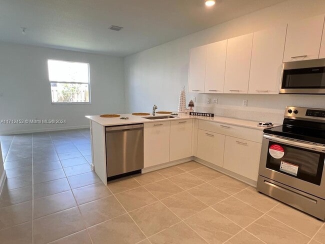 Photo - 12628 NW 23rd Pl Townhome